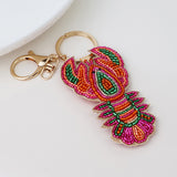 PM Embellished lobster bag charm-keyring
