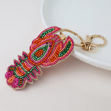 PM Embellished lobster bag charm-keyring