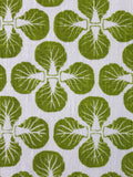 Close up of white Irish Linen tea towel with Brussel Sprouts print.