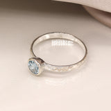 PM Sterling silver hammered ring with blue topaz - Large/L (58)