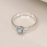 PM Sterling silver hammered ring with blue topaz - Small/S (54)