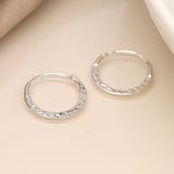 PM Sterling silver little hammered hoop earrings