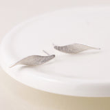 PM Sterling silver brushed marquis twist earrings