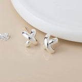 PM Sterling silver rounded kiss stud earrings