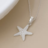 PM Sterling silver starfish necklace